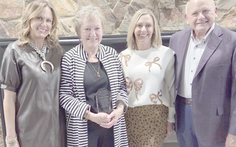 The family of Cynthia Symons turned out for the annual Perryton-Ochiltree Chamber of Commerce Banquet to congratulate her after being named the Citizen of the Year. Pictured are, from left, Melanie Symons Allen, Cynthia Symons, Kerry Symons, and Alyssa Symons Seay.
