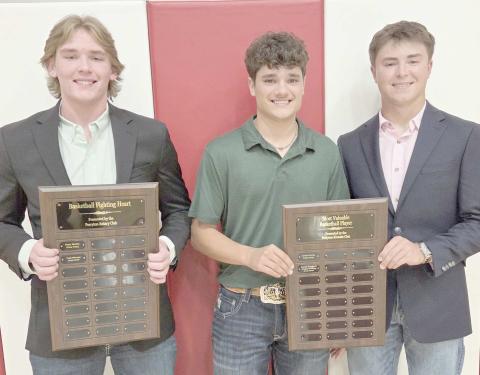 Perryton High School’s boys basketball team was honored on May 4 at the Perryton High School All Sports Awards Banquet. Pictured are, from left: Cash Wheeler, winner of the Fighting Heart award, and Keenan Daugherty and Cooper Schilling, who received the boys MVP award.