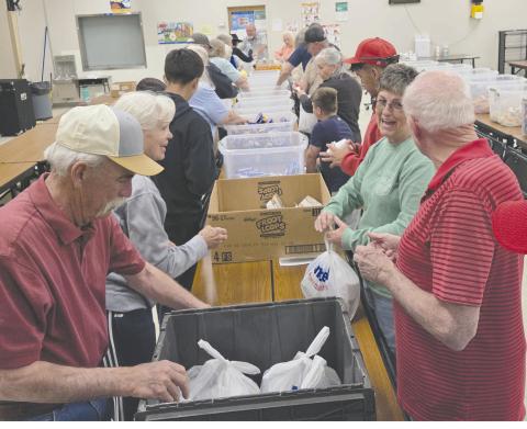 Local volunteers for Snack Pak 4 Kids gathered recently at Williams Intermediate Elementary School to pack snacks for hungry kids. Volunteers meet every few weeks to pack snack bags with nutritious food to help food-insecure students stave off hunger. Volunteers include students from Perryton High School, local business employees, church groups, and people who just want to help. Pictured are, from left, Sammy Judice, Carol Hayden, April Snyder, and Robert McCoy.