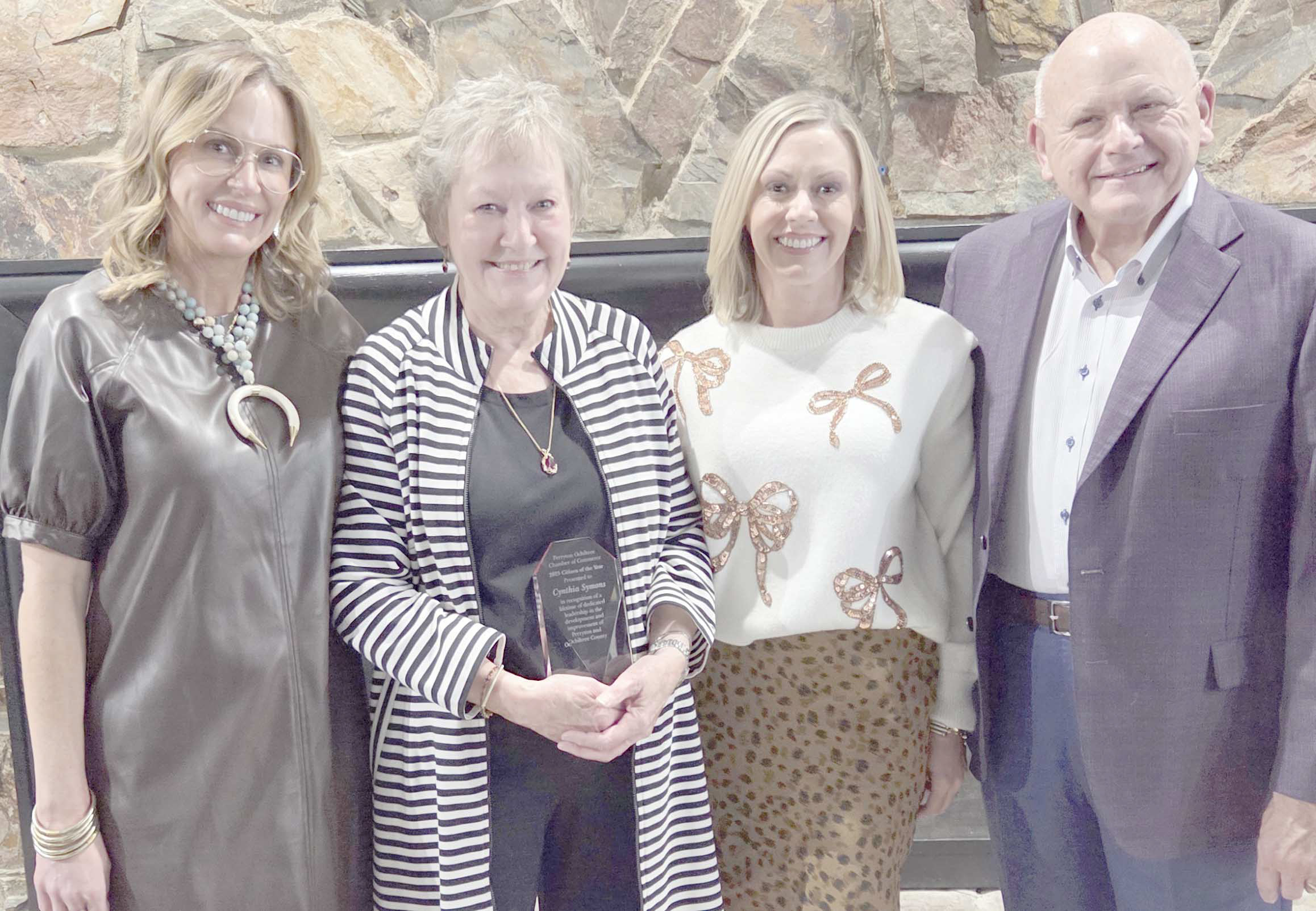 The family of Cynthia Symons turned out for the annual Perryton-Ochiltree Chamber of Commerce Banquet to congratulate her after being named the Citizen of the Year. Pictured are, from left, Melanie Symons Allen, Cynthia Symons, Kerry Symons, and Alyssa Symons Seay.