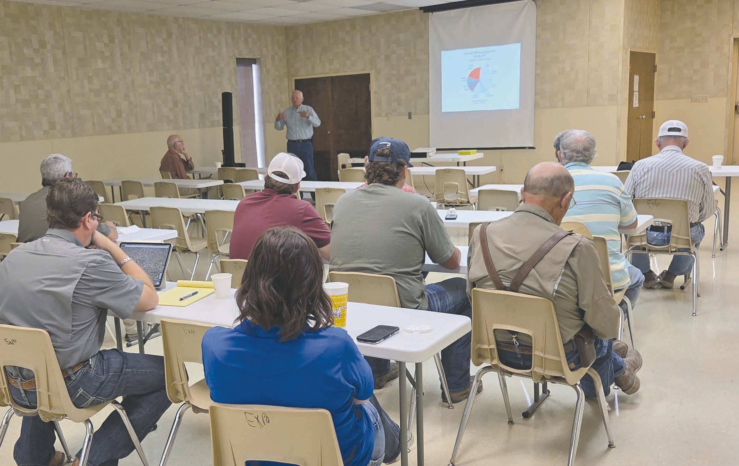 PRODUCERS ATTEND WHEAT CONFERENCE