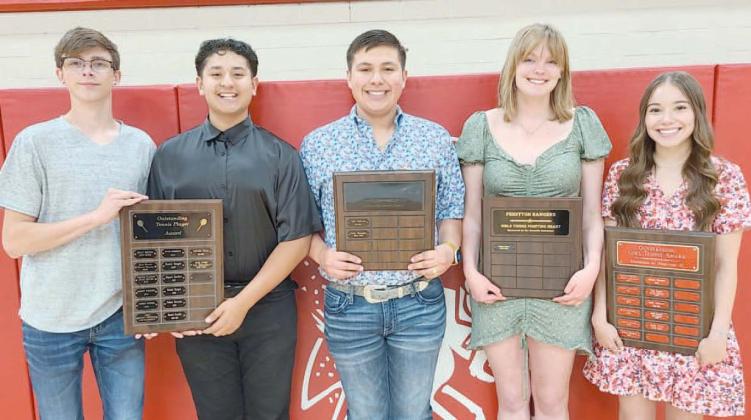 TENNIS HONOREES—Perryton High School’s tennis teams were honored on Monday evening at the Perryton High School All Sports Awards Banquet. Pictured are, from left: Seth Billenwillms and Josue Avalos, who shared the Outstanding Boys Tennis Player award; Carlos Hernandez, who took home the boys’ Fighting Heart award; Braylee Brown, the recipient of the girls’ Fighting Heart award; and Emily Ortiz, winner of the girls’ Outstanding Tennis Player award