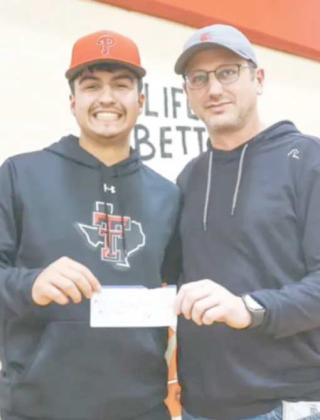 BIG WINNER—Zach Valdez, left, was the big winner in a half-court shot contest sponsored by Perryton Realty during the Ranger and Rangerette basketball games.. He pocketed $500 for making the impressive shot on Feb. 6. To encourage students’ attendance at games, raffle tickets were given to all students attending. If their ticket was drawn, they had a shot at the big prize. Pictured with him is Perryton Realty owner Bryce Hale.