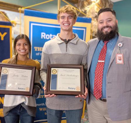 STUDENTS OF THE MONTH—Perryton High School seniors Jocelyn Medina, left, and Jacob Schollenbarger, center, were named the Rotary Club Students of the Month for September. Pictured with them is Dimitri Garcia, student of the month presenter and PJH principal.