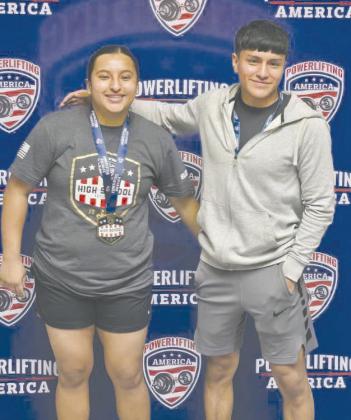 Vanessa Chavira, left, and Jonathan Becerril brought home national champion titles from the meet held in New Orleans last weekend. Two other lifters, Angel Flores and Javier Martinez were the national champ runners up.