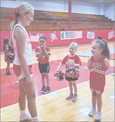 Sure, there are drills and cheer practice and learning dances and all the hard work, but half the fun of cheer camp has got to be hanging out with the big cheerleaders, right? Perryton Junior High School’s cheerleaders hosted the PJH Mini Cheer Camp this week from Monday through Wednesday. Future cheerleaders in grades kindergarten through fifth grade were welcome to attend.