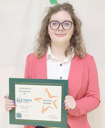 HELPING HAND AWARD— Ochiltree County 4-H held its annual awards ceremony Oct.10 at the Expo Center. Recognized for her willingness to help other 4-H members, the winner of the Helping Hand award was Karson Pribble.