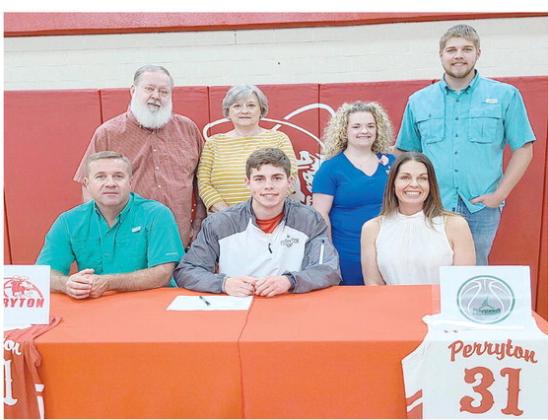 PSHIGODA SIGNS WITH CLARENDON— In May, recent Perryton High School graduate Tad Pshigoda officially signed a letter of intent to play basketball at Clarendon College. Pictured are, from left, front row: Brian Pshigoda, Tad Pshigoda, and Tamarachena Pshigoda; back row: Vernon Pshigoda, Jean Pshigoda, Lexi Pshigoda, and Dillon Pshigoda.