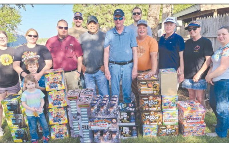 Perryton Lions Club members got together on Saturday morning to get fireworks unloaded and fuses installed in anticipation of their annual Fourth of July fireworks show at Wolf Creek Park. Pictured are, from left, Karson Pribble, Rachel Knapp (with kids Jameson and Amelia), Nick Hale, Brandan Knapp, Nick Yara, Kelly Brown, Daniel Hillman, Paul Dutcher, Frosty Hickerson, Dianne Lee, and Erin Hale.