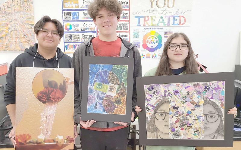 PHS ART STUDENTS SHINE AT OPSU— Art students at Perryton High School participated in the 25th annual Panhandle Area Art Jubilee at Oklahoma Panhandle State University in Goodwell, OK, on April 11-- 13. Students who brought home Merit Awards in the competition included, from left, David Murillo (Photo “Unrealistic Expectation”), Coda Dettmann (Mixed Media - “Fractured”), and Mayreli Navarrete (Mixed Media - “What Is Inside”).