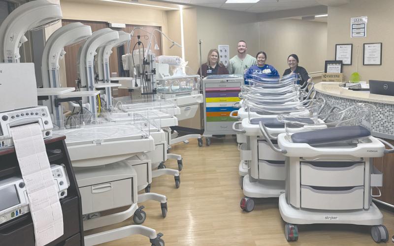 OGH RECEIVES OB EQUIPMENT THROUGH GRANT— Ochiltree General Hospital received a bounty of new obstetrics equipment recently through a quarter-million dollar Rural Hospital Labor and Delivery Grant from the state. The equipment included four fetal heart monitors, five warmers to keep babies warm after birth, six infant cribs, two wireless monitors, and more. Pictured in the back are, from left, Debbie Beck, CFO, who wrote the grant, Patrick Smith, BSN, Kevelin Cervantes, CNO, and Rubi Estrada, ACNO.
