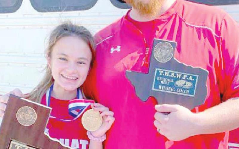 Coach Arruda with one of the 2021 PHS state champion powerlifters Saleen Nyman