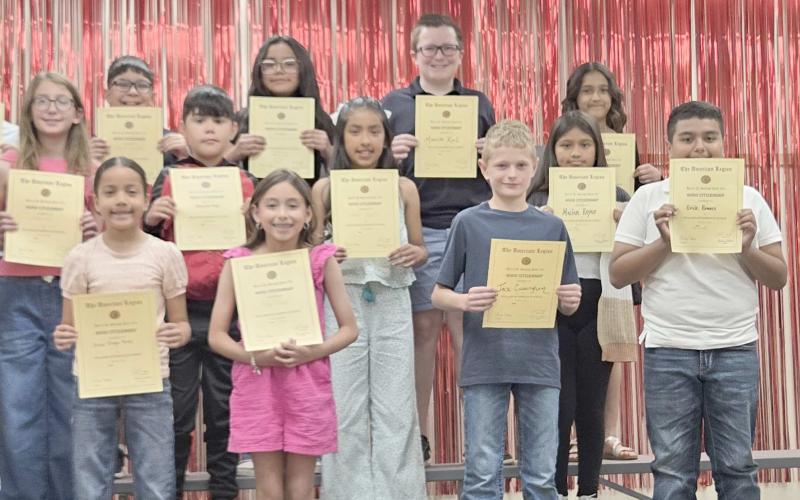 Williams Intermediate School fourth graders receiving American Legion outstanding citizenship awards were, first row, from left, Larissa Roberson, Reina Ortega Perez, Adelyn Olivas, Jax Cunningham, Erik Romero, and American Legion representative J.W. Brown; second row, Arabella Alanize, Lizzie Allred, Alexander Moya, Daniela Becerril Hernandez, and Mailen Reyes; and third row, Ayden Pedroza, Jeffery Hinshaw, Adrian Hernandez, Aleysa Ontiveros, Maverick Kerl, and Emily Osuna
