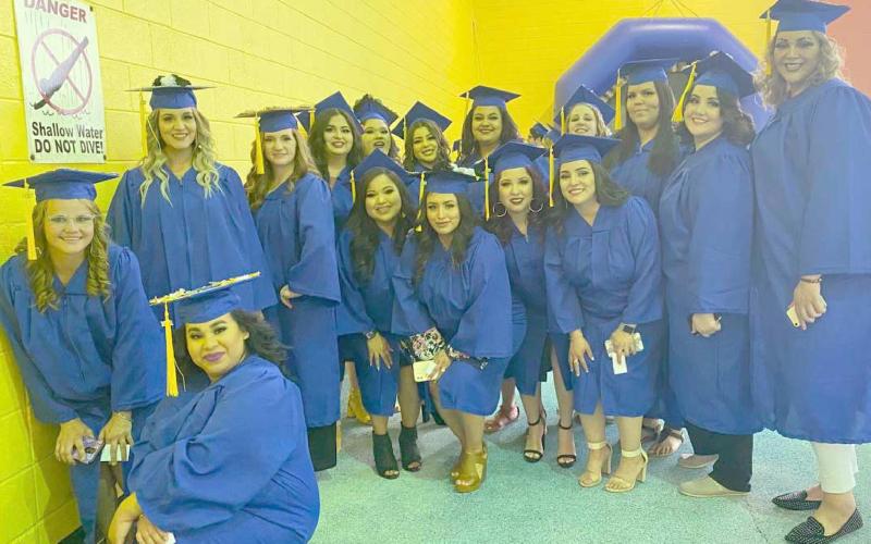 COSMETOLOGY STUDENTS GRADUATE