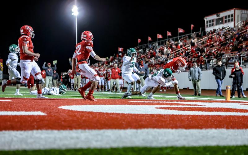 Pepper Haley leans for a touchdown against Monahans Friday night in the Bi-District Championship against Monahans (Photo by John Erickson)