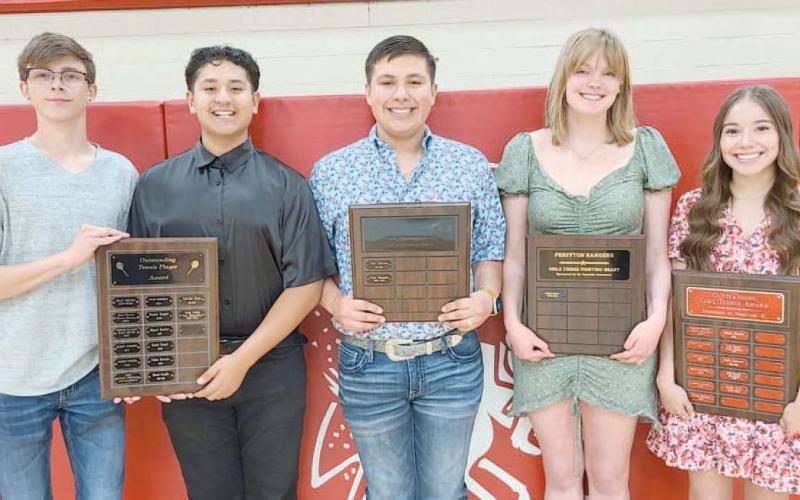 TENNIS HONOREES—Perryton High School’s tennis teams were honored on Monday evening at the Perryton High School All Sports Awards Banquet. Pictured are, from left: Seth Billenwillms and Josue Avalos, who shared the Outstanding Boys Tennis Player award; Carlos Hernandez, who took home the boys’ Fighting Heart award; Braylee Brown, the recipient of the girls’ Fighting Heart award; and Emily Ortiz, winner of the girls’ Outstanding Tennis Player award