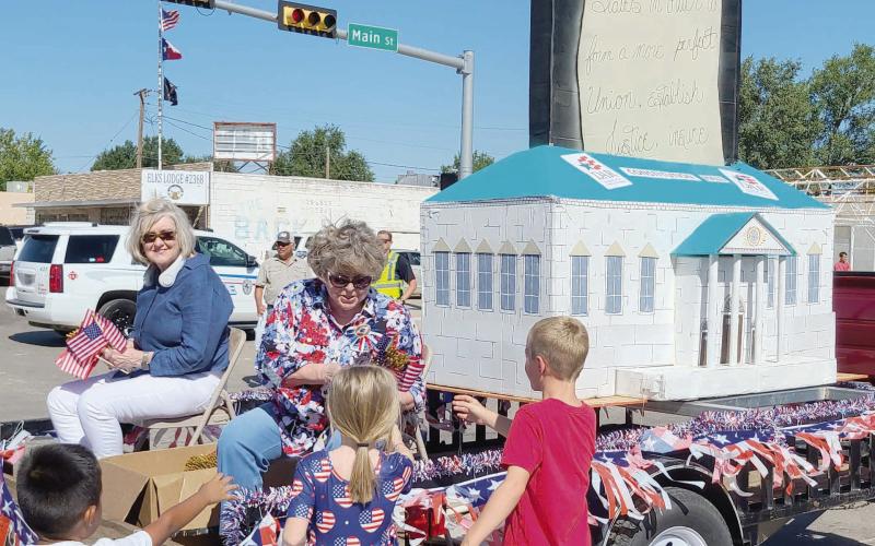 PARADE WINNERS - SECOND PLACE NON-PROFIT—Ochiltree County residents lined Main Street on Saturday, Aug. 19 to watch the annual Wheatheart of the Nation Celebration parade. The second place prize for the Non-Profi t Float category went to the Wolf Creek Chapter of National Society Daughters of the American Revolution.