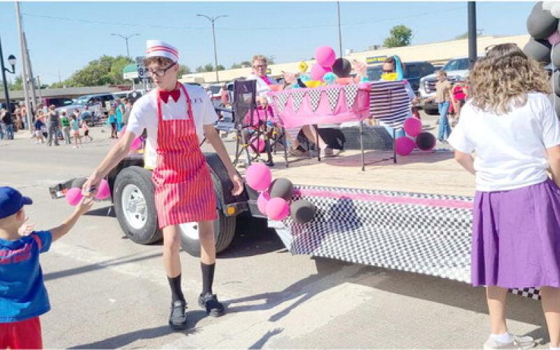 SECOND PLACE COMMERCIAL—It seems like everyone turned out to watch the Wheatheart of the Nation Celebration parade down Main Street. Creative Collections Boutique took home the second place prize in the Commercial Float category.