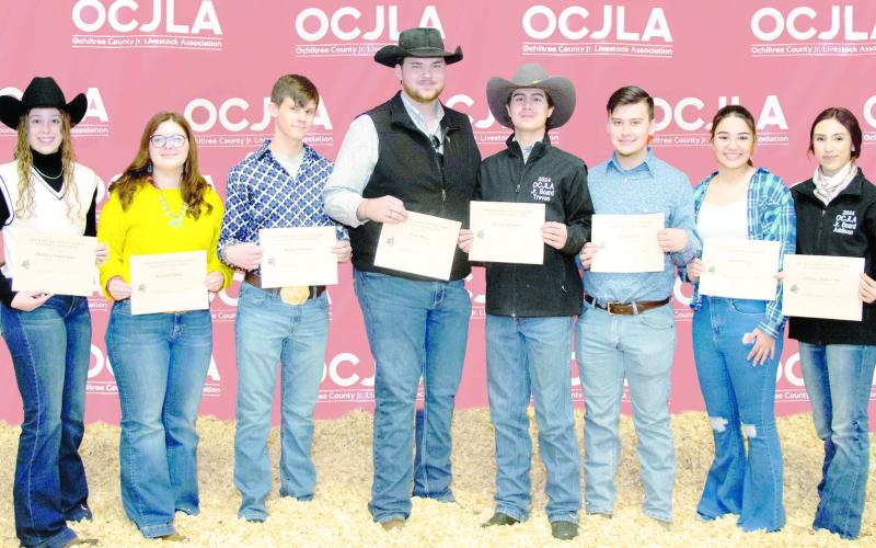 OCJLA SCHOLARSHIP RECIPIENTS—Eight students were awarded scholarships during the Ochiltree County Junior Livestock Show and Sale on Jan. 19-20. Pictured are, from left, Maddie Schickedanz, Karson Pribble, Bradie Flaming, Evan Born, Treven McKinley, Kile Merrick, Alana George, and Addison Miller Cook. Not pictured is Savanna Pshigoda. (Photo credit: Tessa Powell)