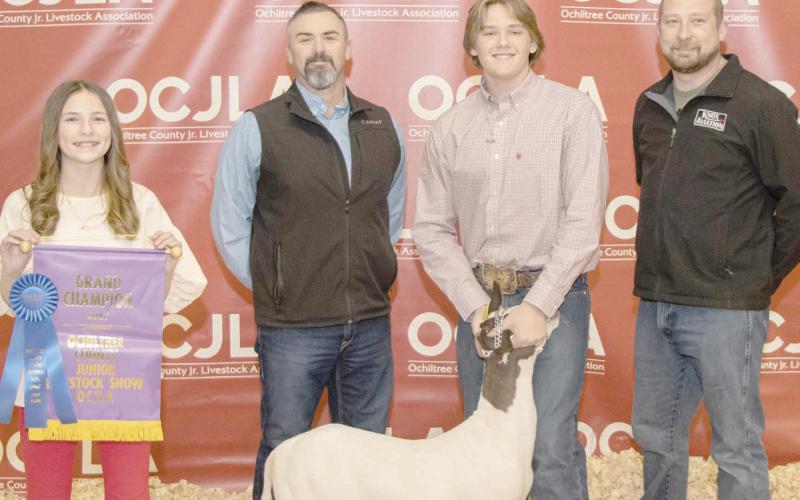GRAND CHAMPION GOAT—The award for Grand Champion Goat at the Ochiltree County Junior Livestock Show and Sale on Jan. 19-20 went to Cash Wheeler. The animal was purchased by Frontier Accessories and Knox Aviation. Pictured from left are Davanee Anderson, Brandt Oquin, Cash Wheeler, and Bear Knox. (Photo credit: Tessa Powell)