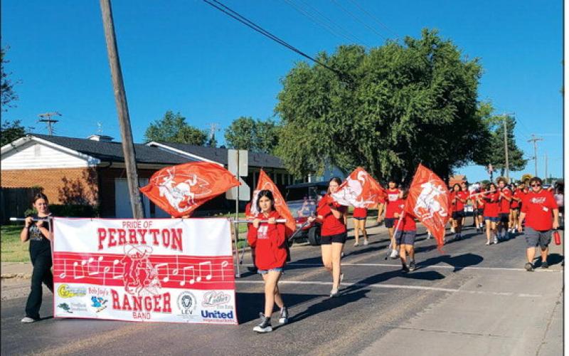 MARATHON MARCHING The Pride of Perryton Ranger Band held a March-a-Thon Saturday morning as they took a three-mile march from the high school, to Williams Intermediate, over to Stark Park, across to Perryton Junior High School, and then back to PHS. The event helps raise funds for the band’s spring trip, helps offset the costs of this year’s marching show, and gets band members a little more marching practice before Saturday morning’s Wheatheart of the Nation Celebration parade.