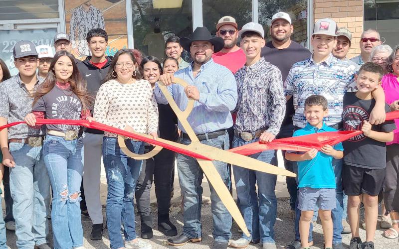 RIBBON-CUTTING HELD AT S&amp;Y WESTERN WEAR—Members of the Perryton-Ochiltree Chamber of Commerce, along with friends, family, staff, and well-wishers were on hand recently for a ribbon-cutting ceremony for S&amp;Y Western Wear at 220 SW 3rd Street in Perryton. The Western wear store is owned by Samuel and Yaneli Alvarez.