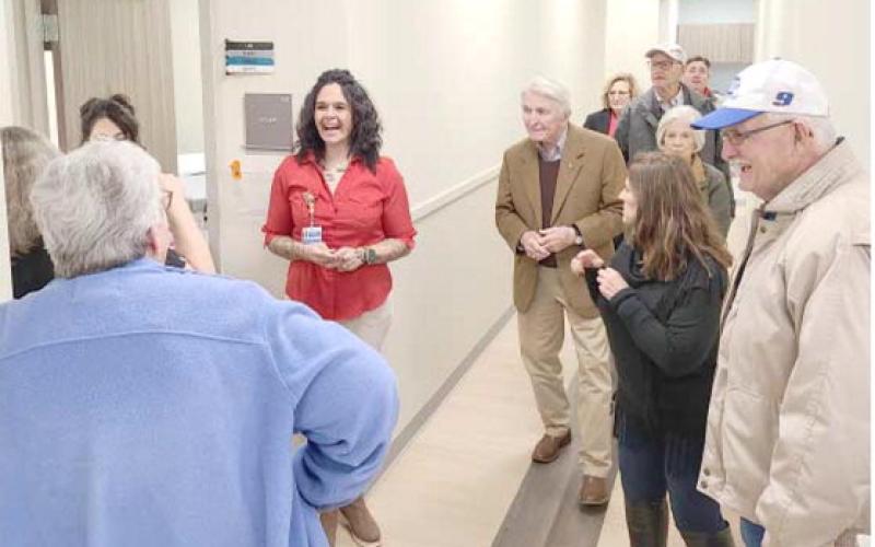 TOURING THE FACILITY—Staff members at the new Perryton Health Center, housed in the L. Kirk Courson Building, adjacent to Ochiltree General Hospital, conducted building tours during the grand opening and open house at the health center. The facility has 32 exam rooms on 14,626 square feet, with space for nine potential health care providers.