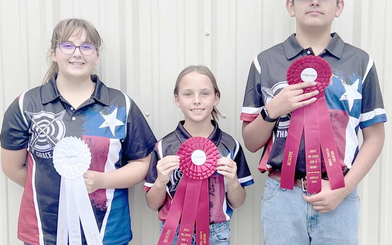 4-H ARCHERS COMPETE AT TRI-STATE FAIR—Students participating in Ochiltree County 4-H’s archery program competed in the Tri-State Fair’s archery competition on Monday, Sept. 15, in Amarillo. There were 40 archers competing in the contest, with ten of those coming from Ochiltree County. Pictured are, from left, Grace Hampton, who won third overall in Recurve Senior, Gabrielle Heck, who took reserve in Recurve Junior, and Ethan Flores, who was reserve in Recurve Senior.