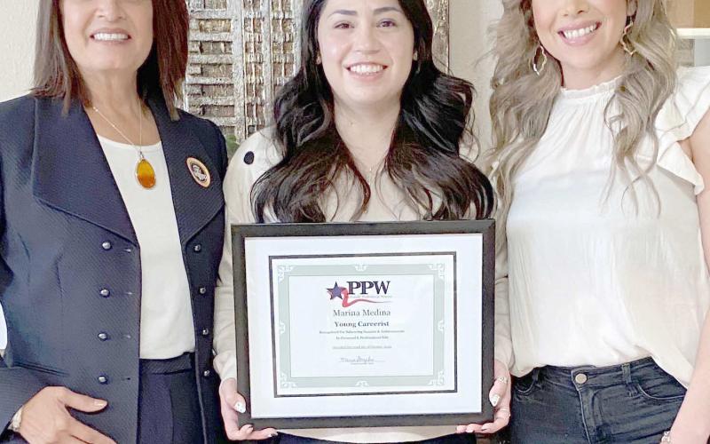 PPWYOUNG CAREERIST— Marina Medina, center, has been named the Young Careerist of the Month by the Panhandle Professional Women’s Club. Pictured with her are Susie Najera, left, and Lupita Mendoza Ottinger.