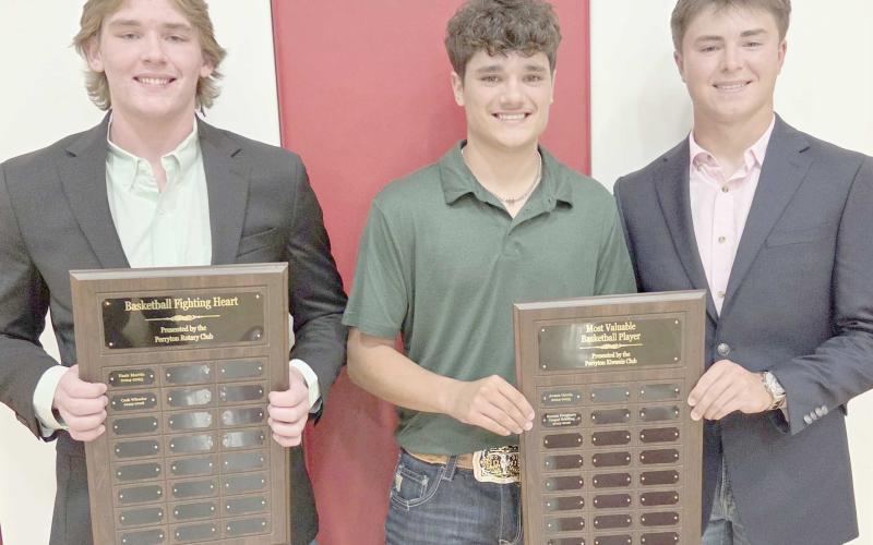 Perryton High School’s boys basketball team was honored on May 4 at the Perryton High School All Sports Awards Banquet. Pictured are, from left: Cash Wheeler, winner of the Fighting Heart award, and Keenan Daugherty and Cooper Schilling, who received the boys MVP award.