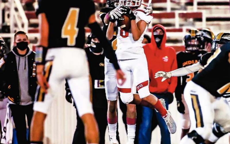 NICE CATCH Isaac Castro (#8 junior) intercepts the Seminole QB and secured another turnover for the Ranger defense against the Seminole Indians Friday during Homecoming festivities at Ranger Field. The Rangers took th e contest, 28-14. See story for more information. (Photo by David Erickson)