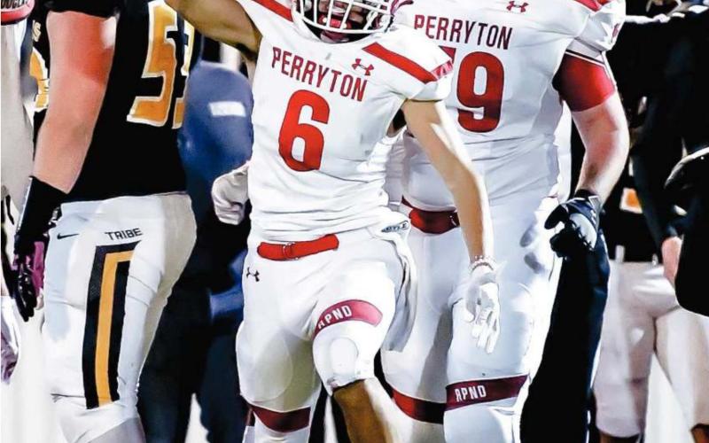 RECOVERY CELEBRATION -Isaac Gabriel celebrates the fumble recovery late in the 4th quarter as the Ranger defense stifles Seminole during Homecoming. See related story for more information. (Photo by David Erickson)