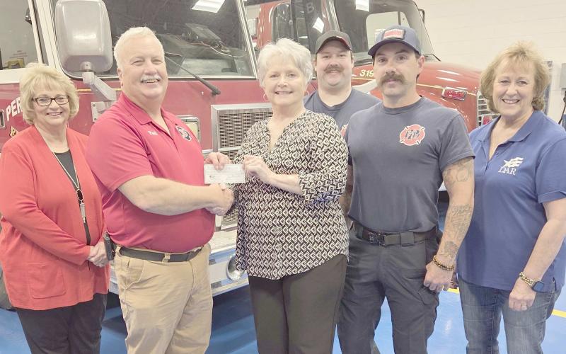 DAR MAKES $1,000 DONATION TO FIREFIGHTERS—