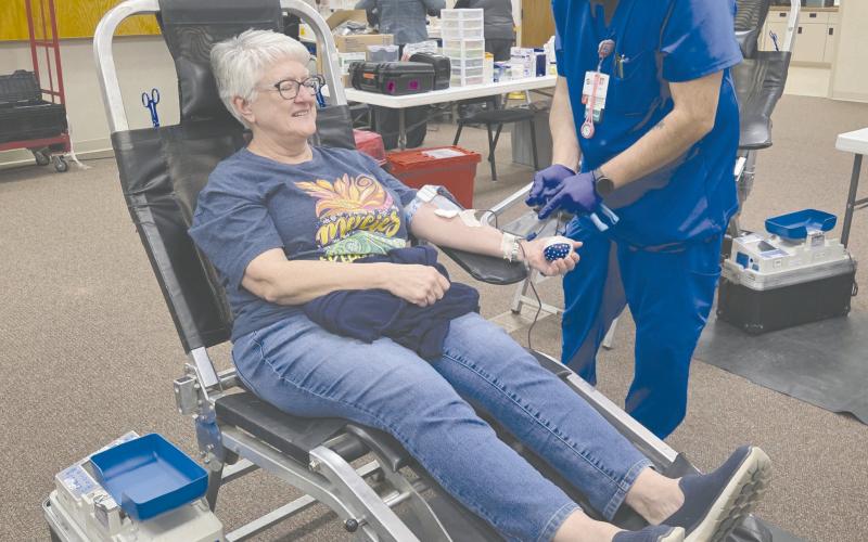 Coffee Memorial Blood Center in Amarillo held a blood drive on Tuesday afternoon at Frank Phillips College, Allen Campus, as they sought to increase the number of blood donors in the area and the amount of blood donated for the entire region. Pictured are, from left, Joan Quist and Coffee Blood Center phlebotomist Joseph Shipp. Quist said her blood type is O negative, one of the most sought-after blood types, so she tries to donate whenever she can.