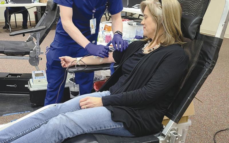 Coffee Memorial Blood Center in Amarillo held a blood drive on Tuesday afternoon at Frank Phillips College, Allen Campus. The drive had a goal of 40 units of blood, but was only able to collect 28 units. A total of 38 people showed up for the drive, but 10 of those were deferred. Pictured are, from left, Coffee phlebotomist Brandon Martinez and donor Nicole Huddleston.