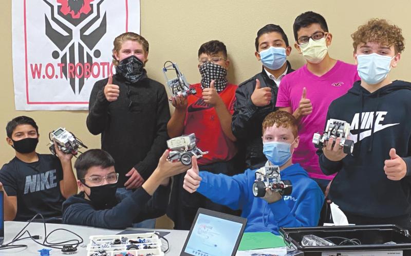 TECHNO WIZARDS Members of Perryton Junior High’s W.O.T Robotics team recently received a number of donations, including $5,000 from Phillips 66. Pictured from left, front row, are Caden Rodriguez, Elijah Garcia, and Trenton Estes; and back row, Gus Eylar, Rogelio Munoz, Saul Palma, Emmanuel Soto, and Sam DeSantiago.