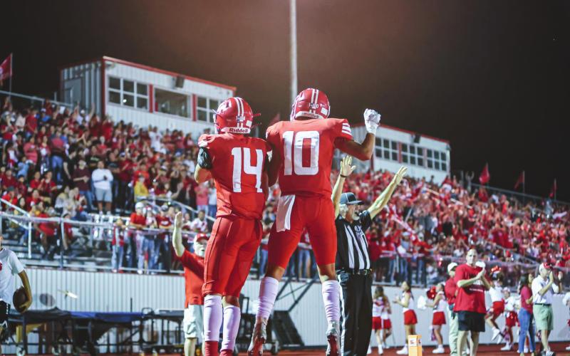 TOUCHDOWN – Ranger Sophomore Julian Cervantes #14 and sophomore Eric Minjares #10 celebrate a touchdown in front of the homecoming crowd during the 4th quarter against the Caprock Longhorns. The Rangers fell 25-18 to Caprock. See story for more information. (Photo courtesy of David Erickson)