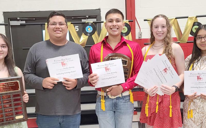Perryton High School students were honored and recognized for their academic achievements during the year at the Academic Awards Banquet held in the Rangerette Gym. Pictured are, from left, front row: Mayreli Navarrete (Outstanding Art Student), Jonathan Ramirez (Outstanding Technology Student), Carlos Hernandez (Outstanding Math and Journalism Student), Madelyn Schickedanz (Outstanding English, Science, Social Studies, and Spanish Student), and Adamaris Banos (Outstanding Business Student).