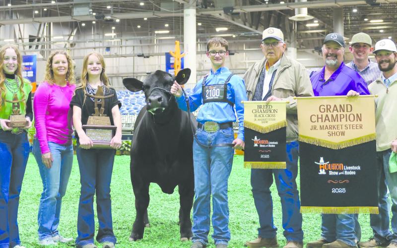 SCHICKEDANZ SHOWS GRAND CHAMPION STEER AT HOUSTON PHS sophomore Jack Schickedanz exhibited the Grand Champion Steer at the Houston Livestock Show, as well as the Grand Champion Market Steer at the Austin Rodeo. Jake’s steer was selected out of 2,000 steers in Houston. Pictured are, from left, Maddie Schickedanz, Amber Schickedanz, Sydney Schickedanz, Kareem the steer, Jake Schickedanz, Larry Schickedanz, Jason Schickedanz, mentor Kirby Eaves, and steer coach Kyle Tarter.