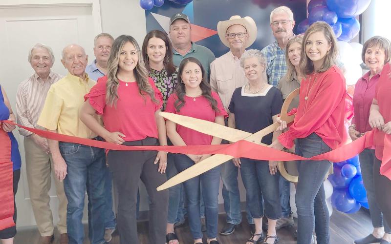 Perryton-Ochiltree Chamber of Commerce members gathered for a ribbon-cutting ceremony for the relocation of Texas Farm Bureau Insurance at 15 SE 5th Avenue, north of the county courthouse, in Perryton.