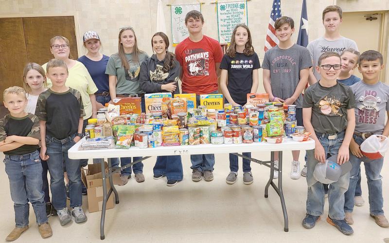 4-H FOOD DRIVE NETS OVER 200 ITEMS— Members of Ochiltree County 4-H held a scavenger hunt food drive last Thursday evening as teams of students roamed Perryton collecting food to donate to Jireh Food Ministry. Members collected 203 food items to donate to Jireh.