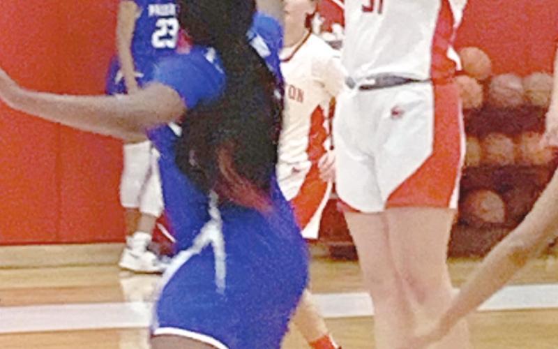 RANGERETTE ACTION—Junior Mackenzi Stokes shoots a contested 15 foot jump shot over a Lady Don, in the Rangerettes’ contest against Palo Duro Friday. The Rettes came up just short in the 41-38 contest.