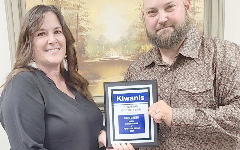 KIWANIAN OF THE YEAR— The Perryton Kiwanis Club recognized Nikki Green as their Kiwanian of the Year for 2023 during their annual banquet last Tuesday evening. Pictured are, from left, Green and Kiwanis president Chase Allison.