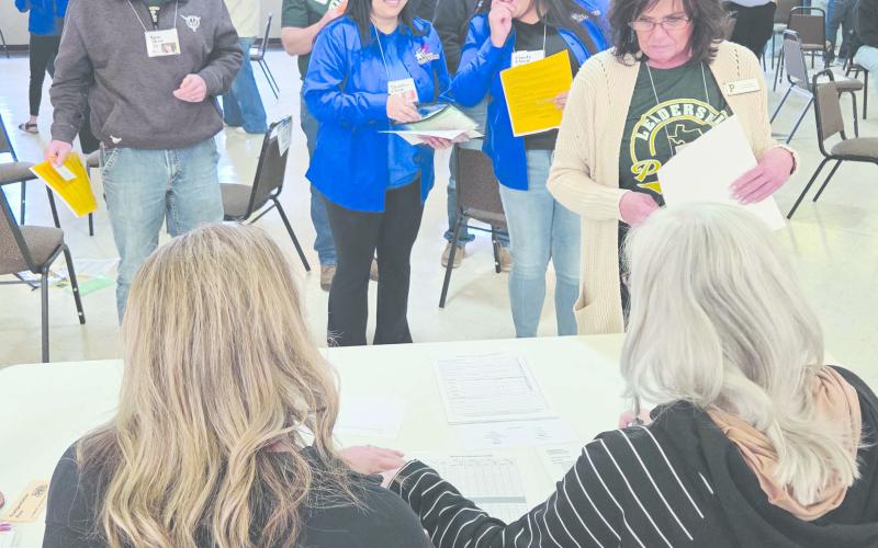 Members of Leadership Perryton XXIV participated in Reality Day, a poverty simulation, on Wednesday, learning about some of the realities and challenges faced by low-income families. Participants in the simulation were given simple roles to play during the project, including newly unemployed people, homeless people, recipients of TANF funds, senior citizens on disability, and single parents. The task assigned to all was to provide basic necessities and shelter during the course of four 15-minute weeks.
