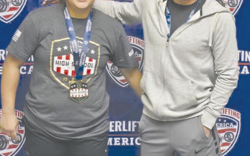 Vanessa Chavira, left, and Jonathan Becerril brought home national champion titles from the meet held in New Orleans last weekend. Two other lifters, Angel Flores and Javier Martinez were the national champ runners up.