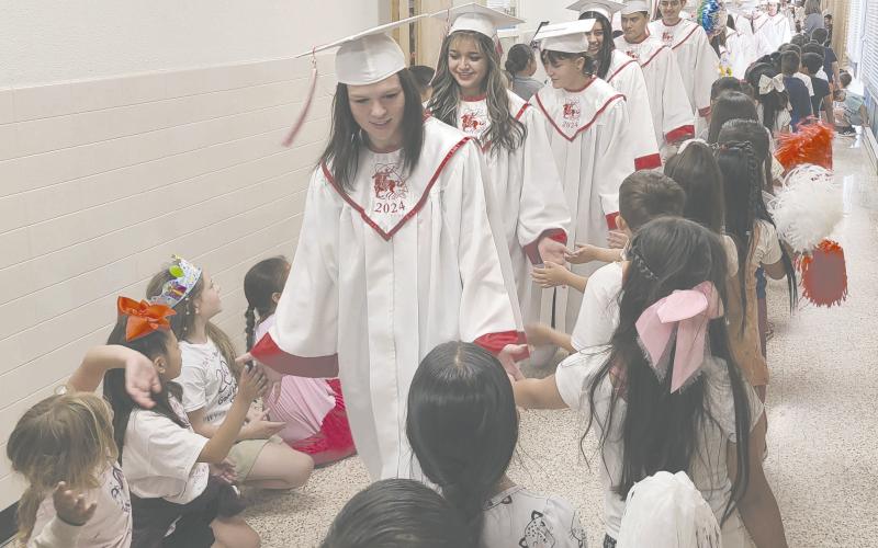Perryton High School’s graduating seniors walked through other Perryton Independent School District campuses last Thursday morning to accept congratulations from other students. Seniors started their tour through PHS before continuing to Perryton Kinder, Perryton Junior High, Wright Elementary, and Williams Intermediate.