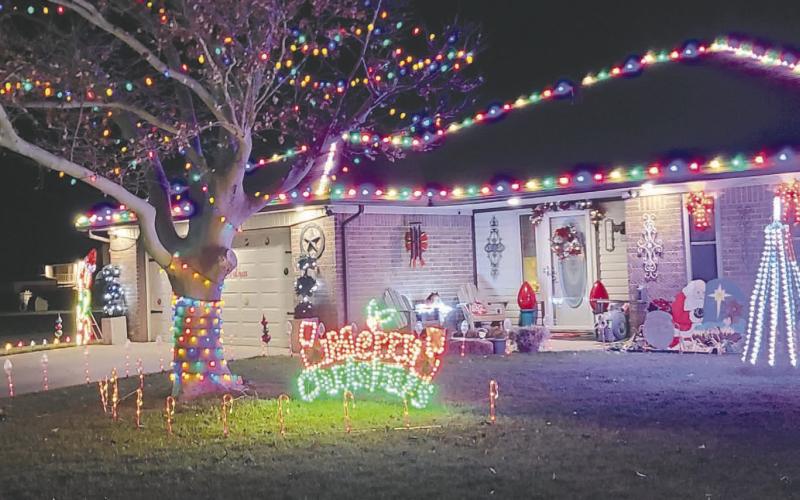 Many Perryton and Ochiltree County residents decorated their homes, both inside and out, for the Christmas season. Bright lights on houses and trees, inflatable snowmen, illuminated nativity scenes and more showed up in yards all over town. Among the brightly decorated houses were the homes of Keith and Dawn Fletcher, at top, at 1805 Utah, and Josh and Chelsey Garcia, at bottom, at 1109 Fordham.