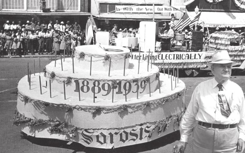 20TH BIRTHDAY — Perryton celebrated its 20th Birthday with a big celebration on August 22, 1939, and this was a prize winning float entered by the Sorosis Club. At right is Judge Geo. M. Perry for whom the city of Perryton is named.