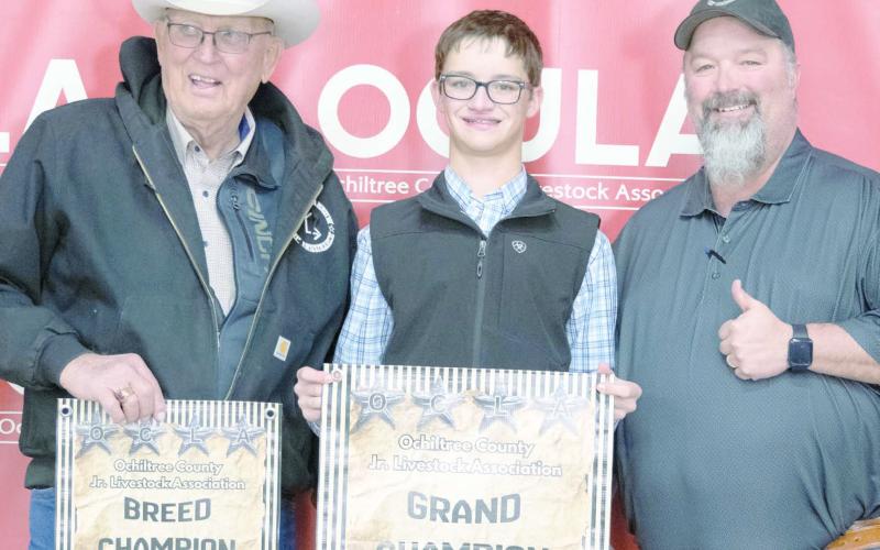 This year’s Grand Champion Steer at the Ochiltree County Junior Livestock Show and Sale on Jan. 16-17 was awarded to Jake Schickedanz. The animal was purchased by Chris Smith Wealth Management and Ag Ingenuity. Pictured are, from left, Larry Schickedanz, Jake Schickedanz, and Jason Schickedanz. (Photo credit: Hailey Clark of Hailey Renee Photography)