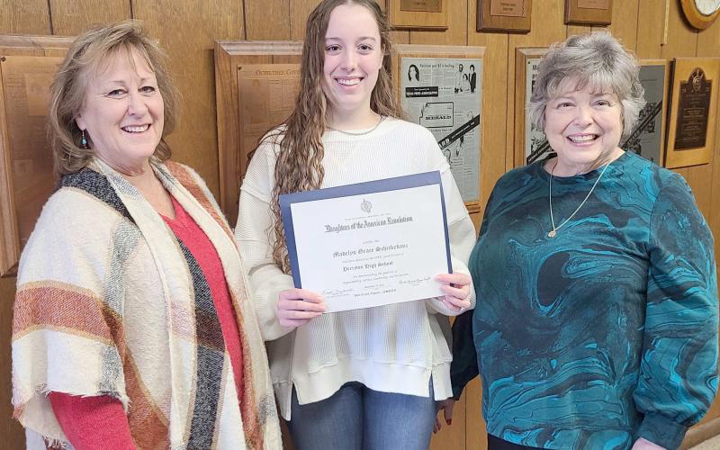 DAR GOOD CITIZEN AWARD— Perryton High School senior Madelyn Schickedanz, center, was the recipient of the Wolf Creek Chapter Daughters of the American Revolution Good Citizen Award scholarship. Pictured with her are chapter regent Sherrie Rima, left, and Good Citizens committee chairman Cheryl Bullard.